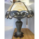 A 1920s US made bi-coloured cast metal table lamp of slender baluster vase design,