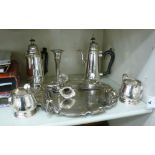 Silver and silver plate: to include a four piece tea set comprising a teapot, hot water pot,