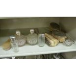 Silver backed dressing table accessories and silver topped glass vessels: to include a pair of hair