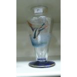 An early 20thC clear and blue glass vase, decorated with a duck in flight 10.