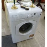 A Hotpoint Aquarius WMF 40 7kg load washing machine 33''h 23''w RAB