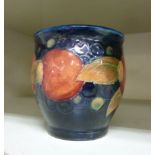 A 1920/30s Moorcroft pottery vase of cylindrical form, decorated in the Pomegranate pattern,