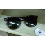 A vintage pair of mens Ray Ban tortoiseshell framed sunglasses with Bausch & Lomb lenses OS2