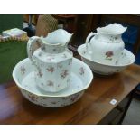 Two late Victorian earthenware wash jugs and bowls,