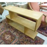 A modern pale oak living room unit with two open shelves,