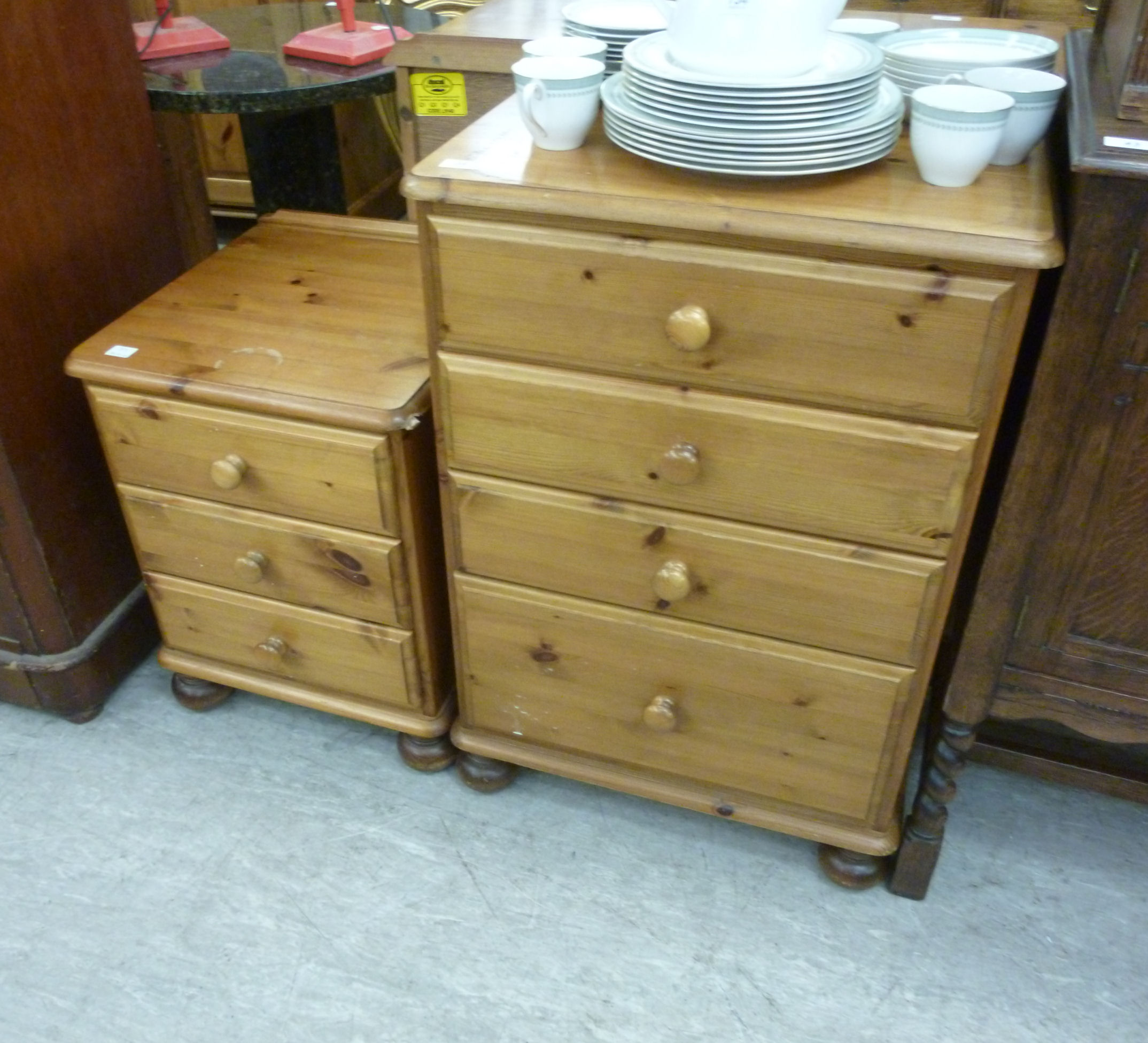 A Ducal pine four drawer dressing chest, raised on turned,