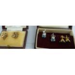 Three pairs of earrings: to include a pair of 9ct gold garnet studs 11