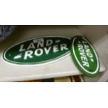 Two green and white painted cast iron Land Rover signs 7''w & 10''w OS8