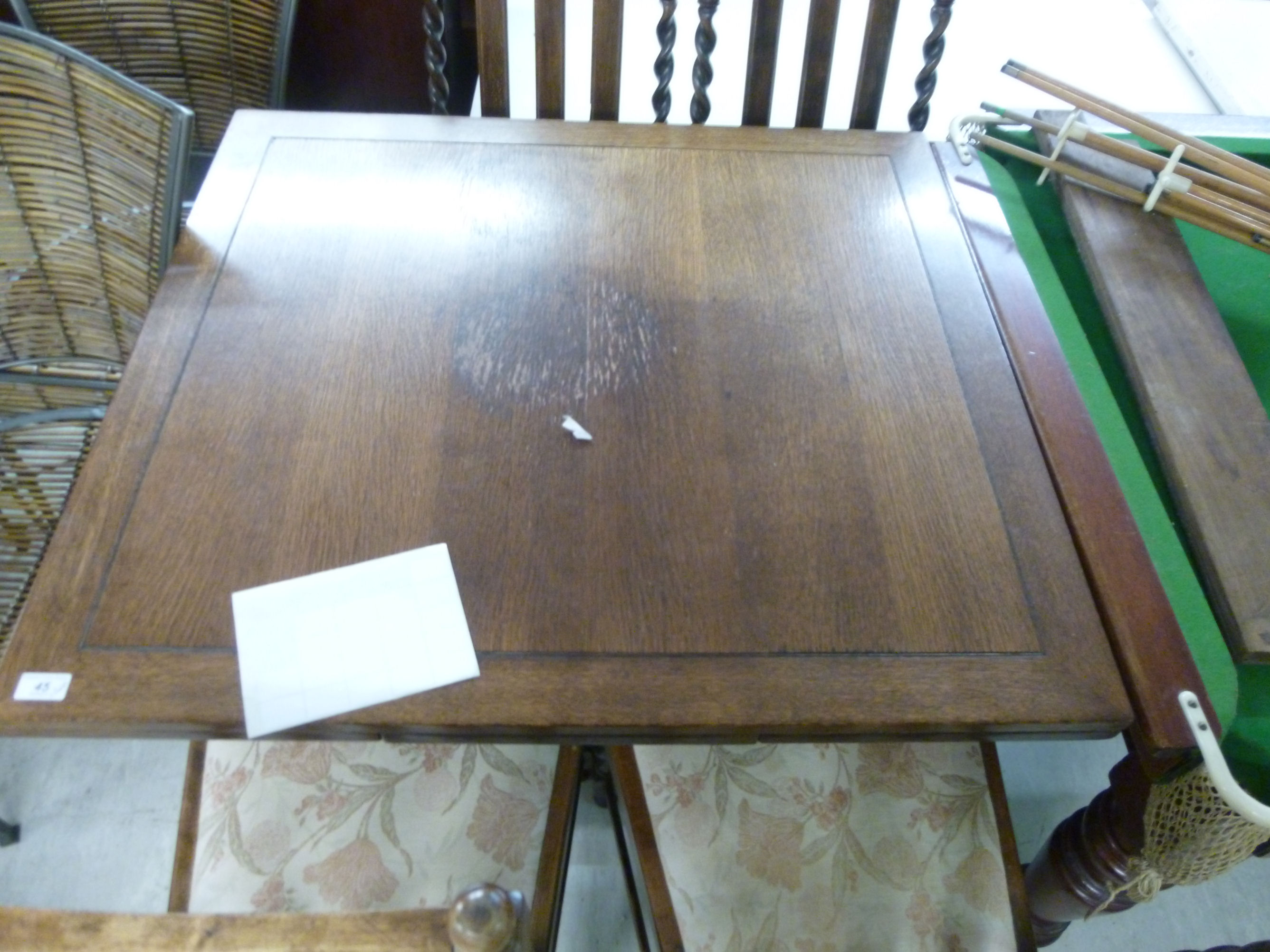 A 1930s oak draw leaf dining table, - Image 2 of 2