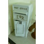 A modern white painted cast iron wall mounted post box 24''h 14''w BSR
