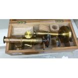 An early 20thC brass microscope,