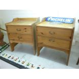 A pair of modern pine two drawer bedside cabinets,
