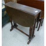 A late Victorian walnut Sutherland table,