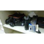Photographic equipment: to include a Minolta AF7000 camera and accessories OS6