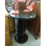 A modern mottled black, green and beige marble conservatory pedestal table,