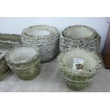 Six similar composition stone garden planters,