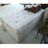 A single divan bed base with two drawers and a mattress 36''w BSR