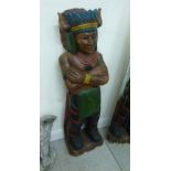 A modern carved and painted hardwood figure,