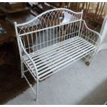 An (as new) cream coloured painted metal folding garden bench with lattice arms,