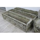 A pair of composition stone planters of rectangular form;