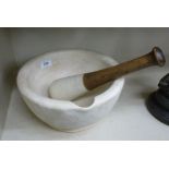 A 20thC white stoneware pestle and mortar RSF