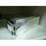 An Art Deco silver cigarette box,
