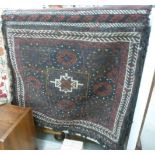 A Belouch saddlebag runner with twin panels of geometric and flowers 27'' x 109'' BSR