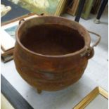 A cast iron cauldron with a swing handle 12''dia BSR