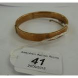 A 9ct gold hollow bangle 11