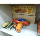 A Louis Marx moulded plastic Fire Chief car; a Japanese tinplate truck set;