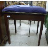 An early 20thC piano stool, the rising upholstered top raised on square,