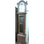 A modern mahogany finished longcase clock with an arched hood,