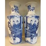 A pair of late 19thC Chinese porcelain vases of cylindrical, tapered form, each having a flared lip,