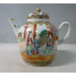 A late 19thC Canton porcelain teapot of bulbous form with a straight spout,