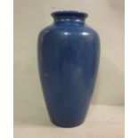 A Rookwood blue glazed pottery vase of baluster form with a flared lip,