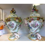 A pair of late 19thC Meissen porcelain inverted pear shaped vases, the pierced domed covers,