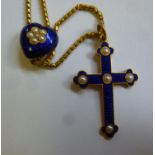 A yellow metal, midnight blue enamel and seed pearl set cross, on a fine link neckchain,