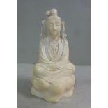 A late 19th/early 20thC Oriental carved ivory standing figure, his hair tied up,