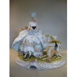 An early 20thC Continental porcelain figure, a woman in 18thC attire,