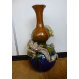 A late Victorian Burmantoft faience vase of double gourd design,