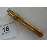 A 9ct gold propelling pencil sleeve with a pendant ring 11