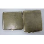 Two similar silver folding cigarette cases with engine turned decoration,
