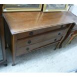 An Edwardian ebony and string inlaid mahogany dressing chest with a low gallery,