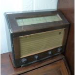 An early 20thC Ecko black painted and mahogany finished cased radio serial no.
