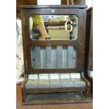 An early/mid 20thC BAC Ltd oak cased, self service dispensing cabinet, for the sale of five,