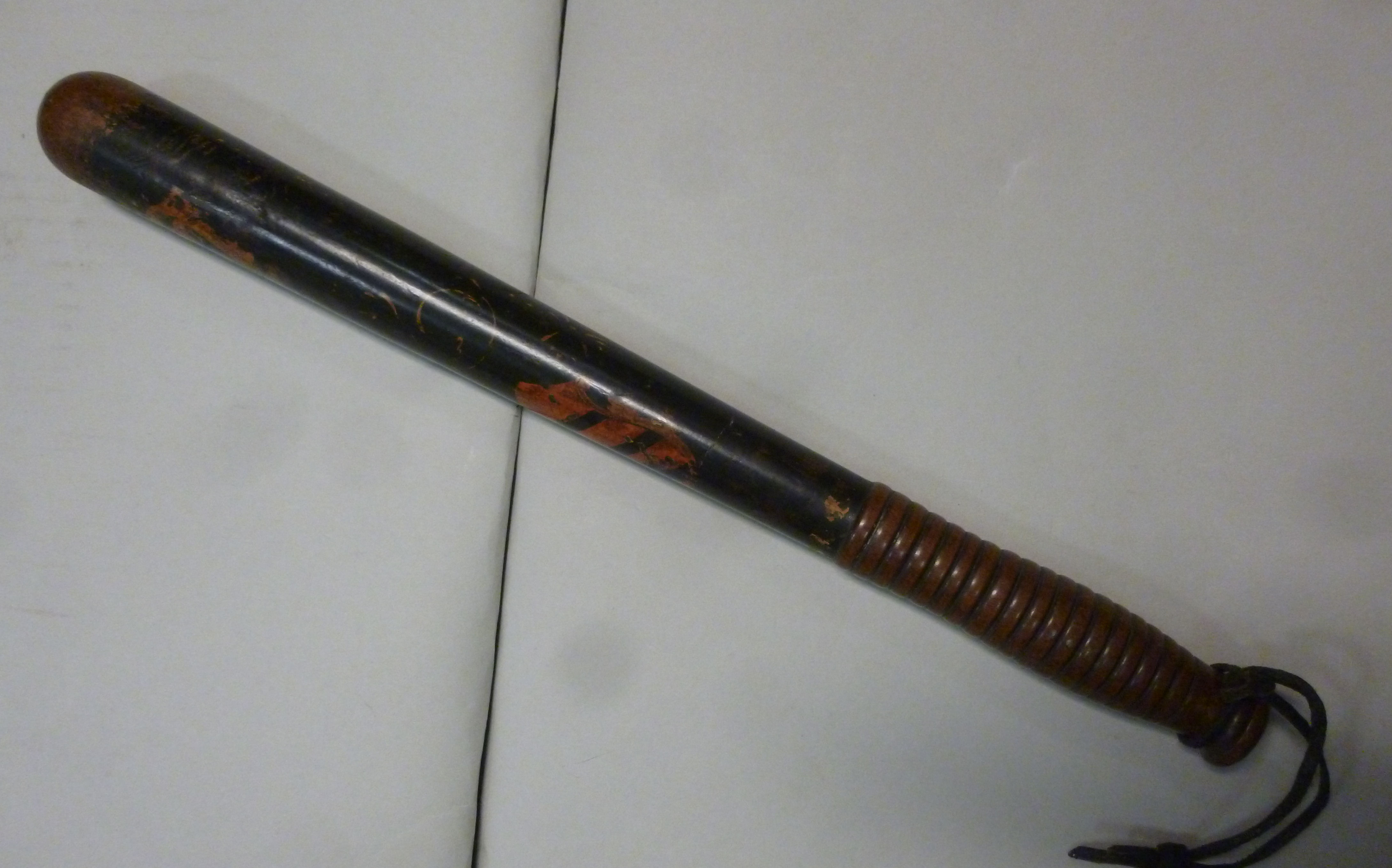 A late 19thC police wooden truncheon, painted in colours on black, impressed PC165, on a ribbed, - Image 9 of 10