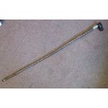 A late Victorian walking stick with a knobbly rootwood shaft and an engraved silver ferrule