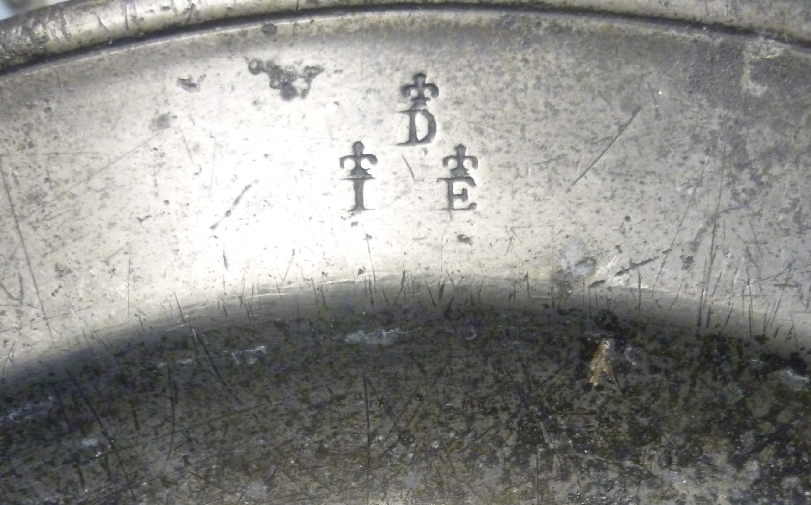 An 18thC pewter broad rimmed charger 12''dia; - Image 3 of 7