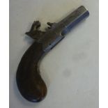 An early 19thC Joseph Egg percussion cap muff pistol with a foliate scroll engraved frame,