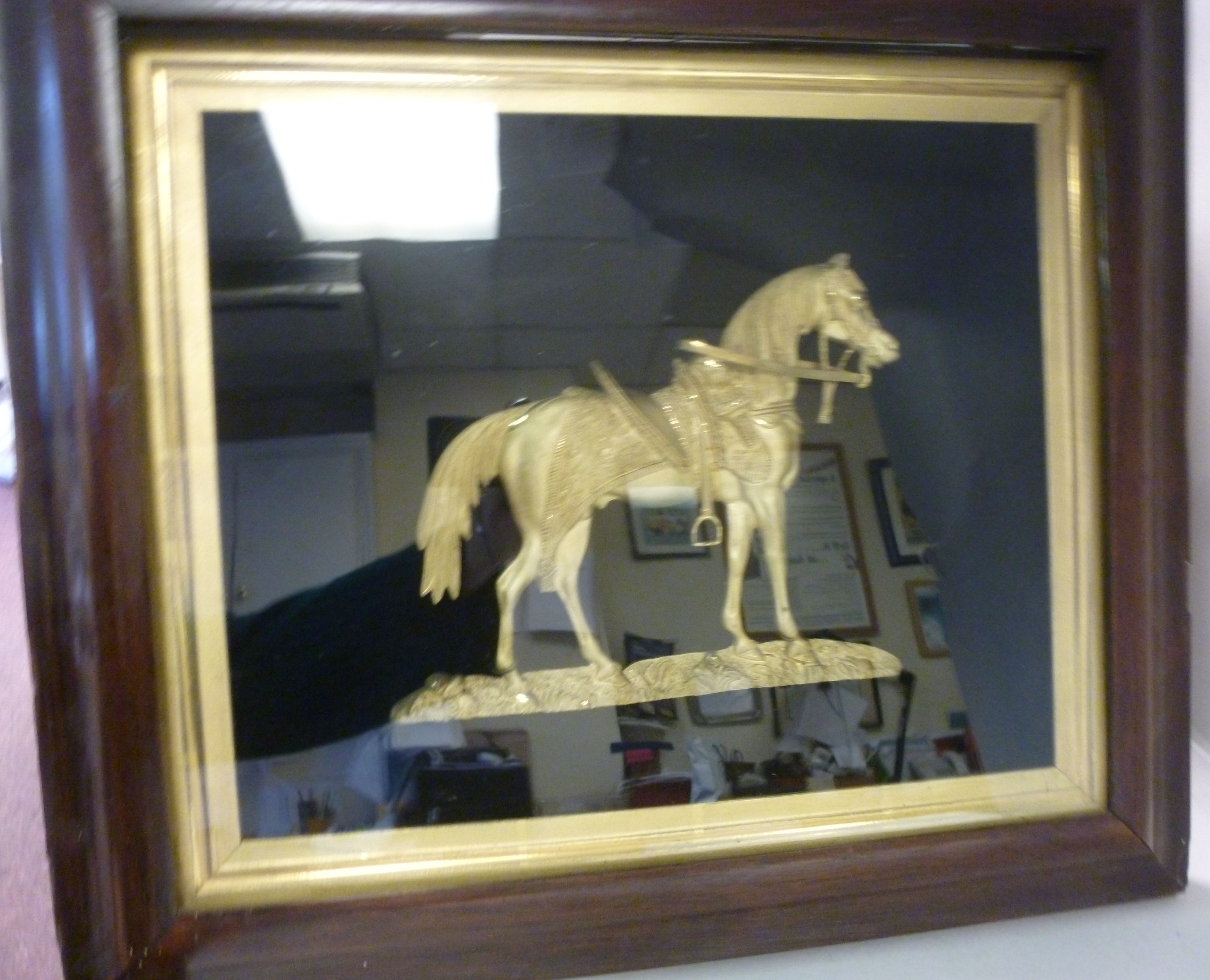 A mid/late 19thC Continental cast gilt metal plaque, a saddled, standing horse,